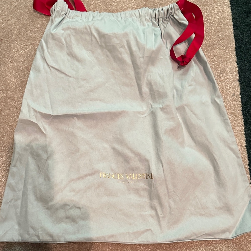 Frances Valentine light blue dust bag with Bold Red Details draw string.